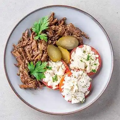 Greek Pulled Beef Bowl with Feta, Baked Tomatoes & Gherkins
